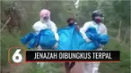 Jenazah terkonfirmasi positif Covid-19 di Ende, Nusa Tenggara Timur, dimakamkan tidak selayaknya protokol Covid-19. Jenazah hanya dibungkus terpal dan digotong petugas pemulasaraan. Jenazah Covid-19 dibungkus terpal karena tidak ada peti, maupun plas...
