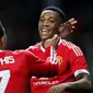 Pemain Manchester United, Anthony Martial, mencetak gol ketiga ke gawang Ipswich Town dalam laga putaran ketiga Piala Liga Inggris di Stadion Old Trafford, Manchester, Inggris, Kamis (24/9/2015) dini hari WIB. (Reuters/Andrew Yates)