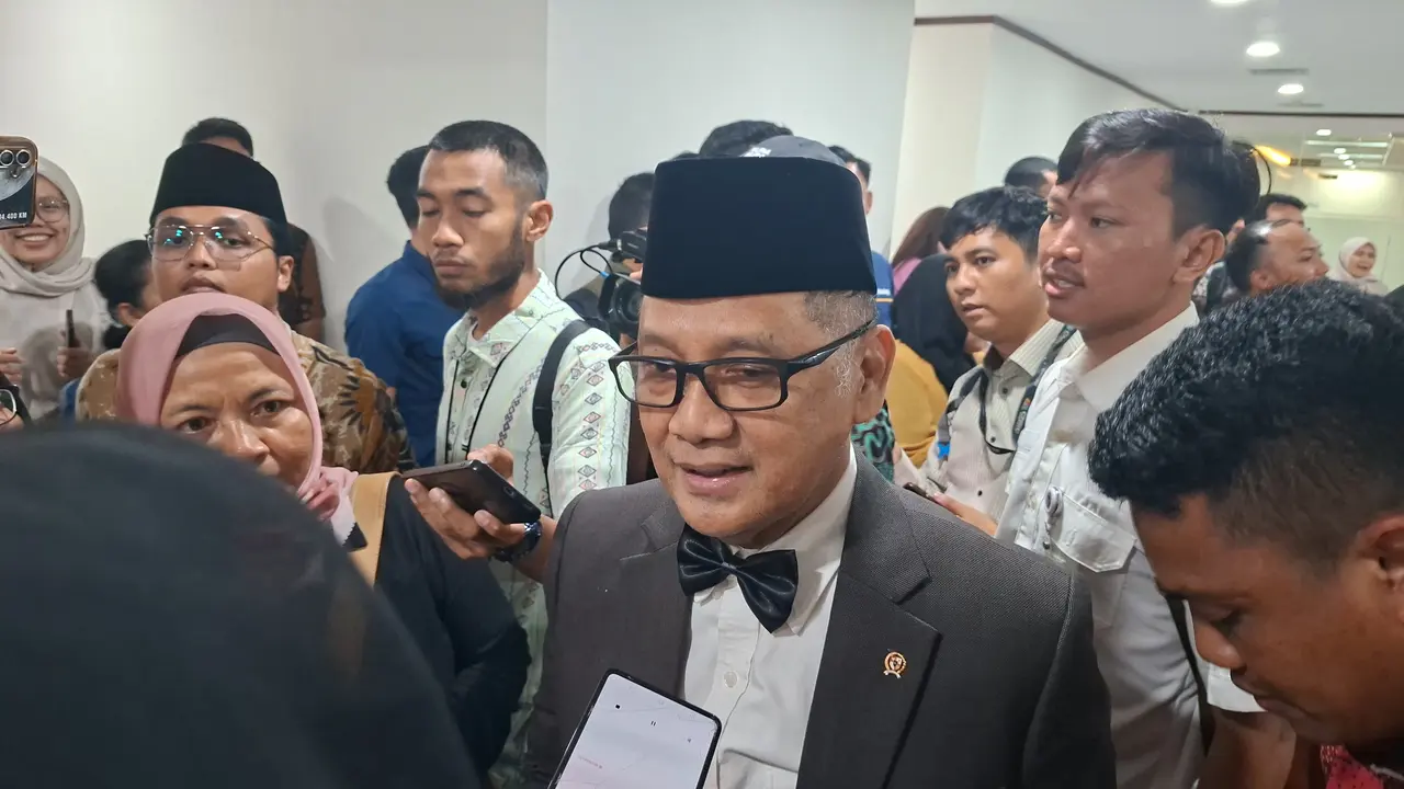 Menteri Haji dan Umrah, Mochamad Irfan Yusuf di Kantor Kementerian Koordinator Bidang Pangan, Jakarta, Selasa (21/4/2026). (Foto: Liputan6.com/Arief RH)