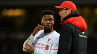 Daniel Sturridge (kiri) bersama manajer Liverpool Jurgen Klopp (kanan). (AFP/Glyn Kirk)