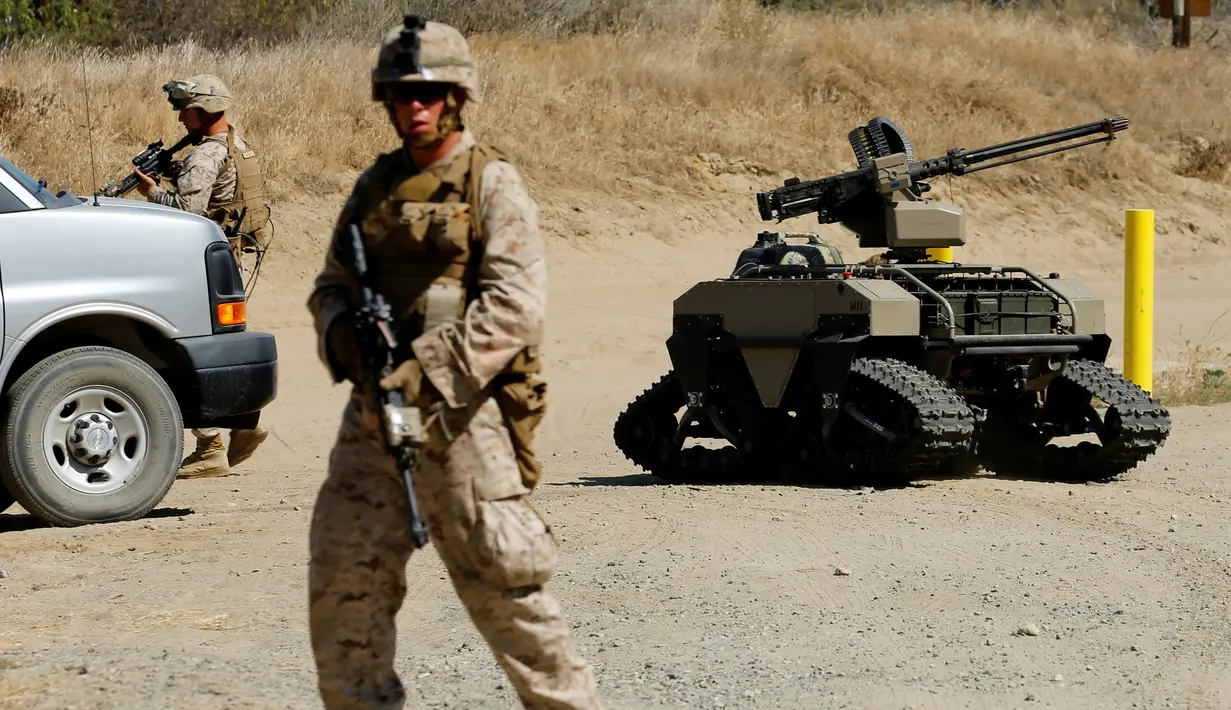 MUTT tampak melakukan patroli saat latihan militer Rim Pasifik (RIMPAC) 2016 di Camp Pendleton, Amerika Serikat, (13/7). Alat ini dilapisi dengan baja yang kuat dengan perlengkapan senjata pemusnah. (REUTERS / Mike Blake)