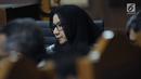 Terdakwa dugaan gratifikasi dan suap pemberian izin lokasi perkebunan kelapa sawit, Rita Widyasari saat mengikutii sidang lanjutan di Pengadilan Tipikor, Jakarta, Selasa (3/4). Sidang mendengar keterangan saksi. (Liputan6.com/Helmi Fithriansyah)