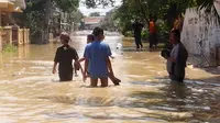 Banjir rendam permukiman di Bojongkulur, Kecamatan Gunungputri, Kabupaten Bogor, Jawa Barat. (Liputan6.com/Achmad Sudarno)
