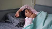 Ilustrasi tidur, bermimpi. (Foto oleh World Sikh Organization of Canada: https://www.pexels.com/id-id/foto/gadis-tempat-tidur-kamar-tidur-berbohong-18870322/)
