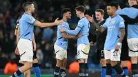 Manchester City merayakan kemenangan atas Club Brugge dalam laga matchday 8 Liga Champions 2024/2025 di Etihad Stadium, Kamis (30/1/2025) dini hari WIB. (Paul ELLIS / AFP)