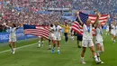 Para pemain Amerika Serikat merayakan gelar juara Piala Dunia Wanita 2019 usai mengalahkan Belanda pada laga final di Stadion Lyon, Lyon, Minggu (7/7). AS menang 2-0 atas Belanda. (AFP/Phillippe Desmazes)