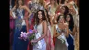 Paulina Vega berpose usai dinobatkan sebagai Miss Universe 2014 dalam kontes wanita tercantik sejagad di FIU Arena, Doral, Miami, Minggu (25/1/2015). (AFP PHOTO/Timothy A. CLARY)