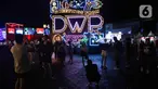 Suasana festival musik Djakarta Warehouse Project (DWP) 2022 di JIExpo Kemayoran, Jakarta, Jumat (9/12/2022). Festival musik elektronik yang menampilkan disjoki dari dalam negeri dan mancanegara ini berlangsung selama tiga hari hingga Minggu, 11 Desember mendatang. (Liputan6.com/Herman Zakharia)