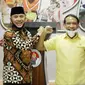 Menteri Pemuda dan Olahraga (Menpora) Zainudin Amali bersama Ketua Umum PSSI Mochamad Iriawan memberikan keterangan pers kepada wartawan terkait persiapan penyelenggaraan Piala Dunia U-20 2021 di Media Center Kemenpora, Jakarta, Jumat (3/7).