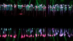 Bunga-bunga kaca menyinari NightGarden di Fairchild Tropical Botanic Garden, Miami, AS, Kamis (29/11). Acara liburan ini mengubah 23 hektare lahan menjadi taman interaktif. (AP Photo/Lynne Sladky)