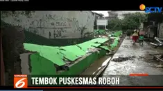 Tembok sepanjang 20 meter dengan ketinggain dua meter itu tergerus banjir lantaran derasnya aliran Sungai Ciliwung.