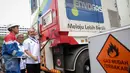 Direktur Jenderal Minyak dan Gas Bumi, IGN Wiratmaja Puja (kanan) dan Dirut Pertamina Dwi Soetjipto saat peresmian Mobile Refueling Unit (MRU) atau SPBG yang dapat berpindah lokasi, di Lapangan Banteng, Jakarta, Senin (16/11). (Liputan6.com/Faizal Fanani)