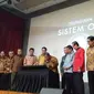 Menteri Koordinator bidang Perekonomian, Darmin Nasution resmi meluncurkan sistem perizinan terintegrasi secara elektronik (online single submission/OSS) di Jakarta. Foto: Merdeka.com/Anggun P Situmorang.
