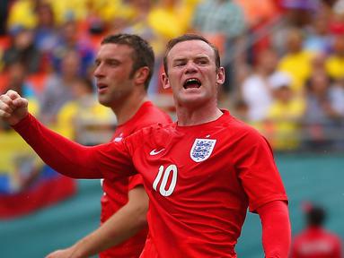 Wayne Rooney memimpin top scorer timnas Inggris dengan 53 gol, Gol pertama Rooney untuk Inggris pada tanggal 6 september 2003. Rooney berpeluang menambah  gol jika tampil pada Piala Dunia 2018. (Richard Heathcote/Getty Images/AFP)