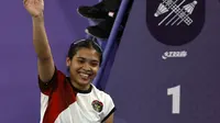 Tunggal putri Indonesia Gregoria Mariska Tunjung merayakan kemenangan atas Ratchanok Intanon dari Thailand dalam pertandingan perempat final bulu tangkis Olimpiade Paris 2024 di Porte de la Chapelle Arena, 3 Agustus 2024. (Luis TATO / AFP)