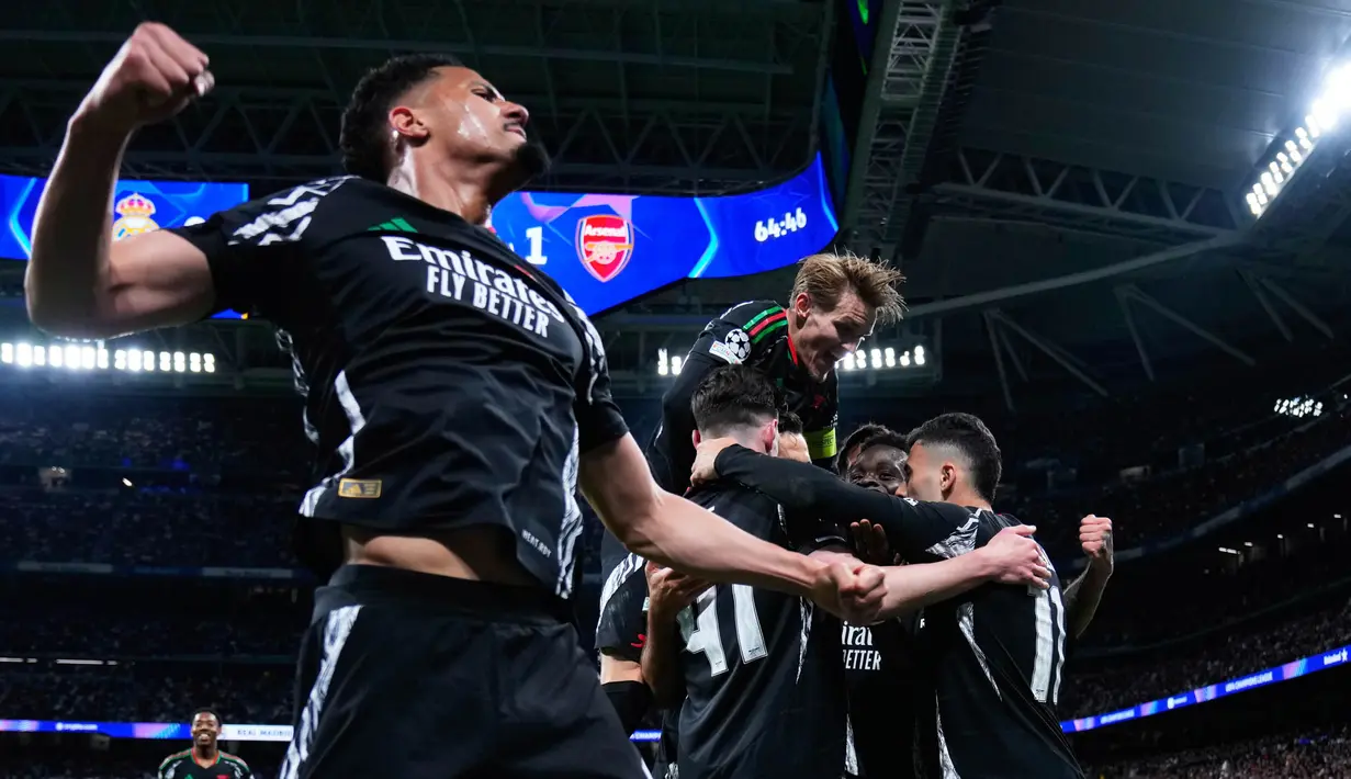 Arsenal menaklukkan Real Madrid 2-1 di leg kedua perempat final Liga Champions. (AP Photo/Manu Fernandez)