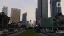 Suasana kawasan Bundaran HI, Jakarta, Jumat (31/12/2021). Polda Metro Jaya melarang perayaan malam tahun baru 2022 di seluruh wilayah DKI Jakarta. Kebijakan itu berlaku mulai 31 Desember 2021 hingga 2 Januari 2022. (Liputan6.com/Angga Yuniar)