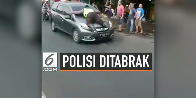 VIDEO: Terjadi Lagi, Polisi Ditabrak dan Berada di Atas Kap Mobil Berjalan