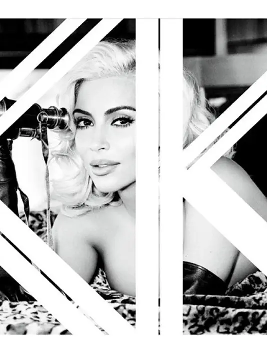 Kim Kardashian terlihat berseri-seri dalam pemotretan dimana ia hanya mengenakan sarung tangan hitam. Seperti biasa, Kim melakukan pose telanjang. (via eprotoeu.mtiny.com)