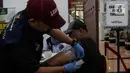 Layanan ini diharapkan menjadi sarana edukasi kesehatan tentang tato dan cara menghapusnya. (LIputan6.com/Herman Zakharia)