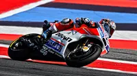 Meski bahagia bisa meraih podium ketiga di MotoGP San Marino, Andrea Dovizioso tak sepenuhnya puas dengan performa motornya. (Twitter/@AndreaDovizioso)