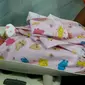 Bayi laki-laki dalam tas bunga-bunga di Pekanbaru (Liputan6.com / M.Syukur)