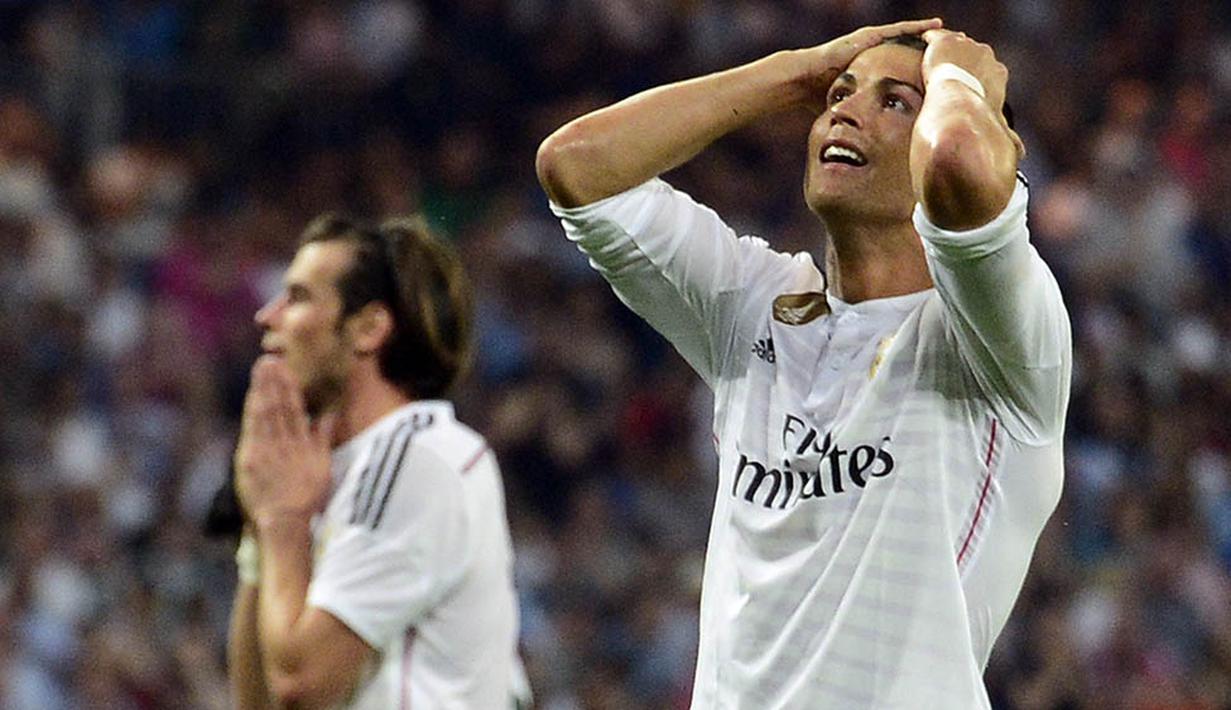 2. Hubungan Gareth Bale dengan bintang Real Madrid, Cristiano Ronaldo, juga tidak terlalu baik. CR7 selalu ingin tampil paling menonjol dan tidak ingin memberikan Bale kesempatan melebihi dirinya. (AFP/Gerard Julien)