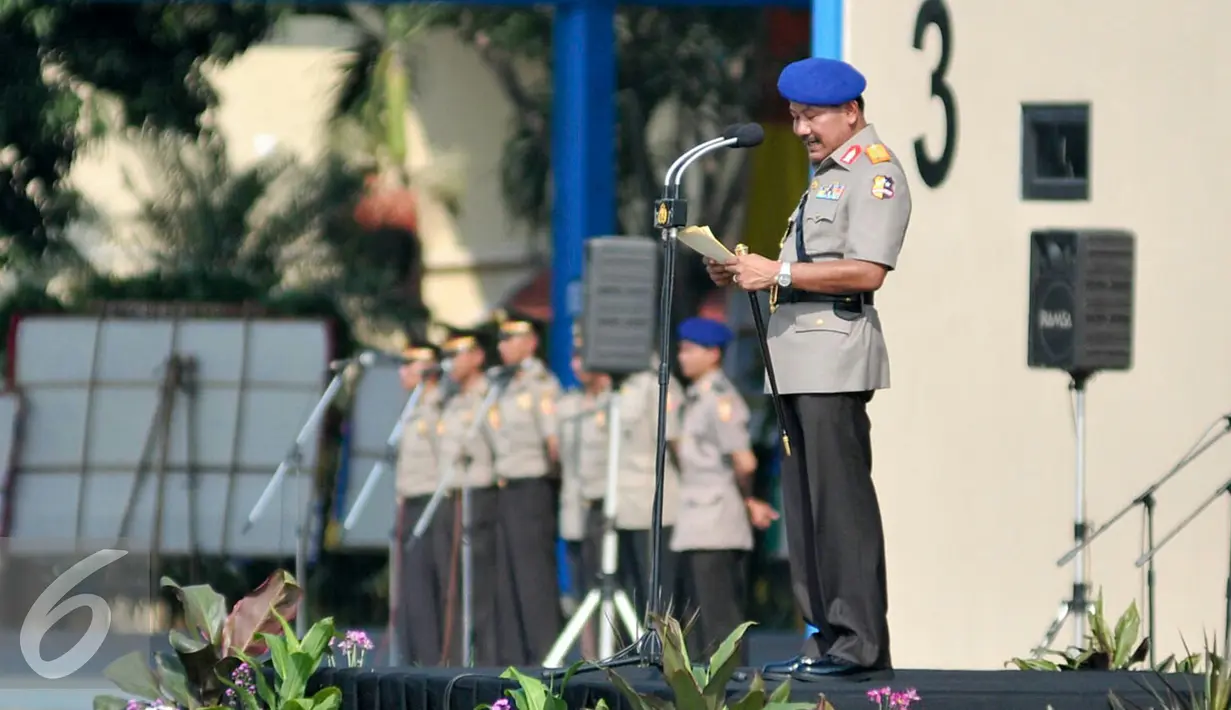 Kapolri Jenderal Polisi Badrodin pimpin upacara HUT ke-65 Polisi Air dan Udara (Polairud) di Markas Korps Direktorat Polisi Udara Baharkam Polri, Pondok Cabe, Pamulang, Tangerang Selatan, Senin (1/12). (Liputan6.com/Yoppy Renato)