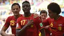 Divock Origi (tengah) mulai tak dipanggil untuk memperkuat Timnas Belgia pada Euro 2020 lalu. Alasannya karena dirinya mulai terpinggirkan di skuat Liverpool asuhan Klopp. Origi jarang dimainkan akibat ketatnya persaingan di lini depan The Reds. (Foto: AFP/Kirill Kudryavtsev)