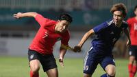 Duel Korsel vs Jepang di partai final sepak bola Asian Games 2018 di Stadion Pakansari, Cibinong, Sabtu (1/9/2018). (Bola.com/Dok. INASGOC)