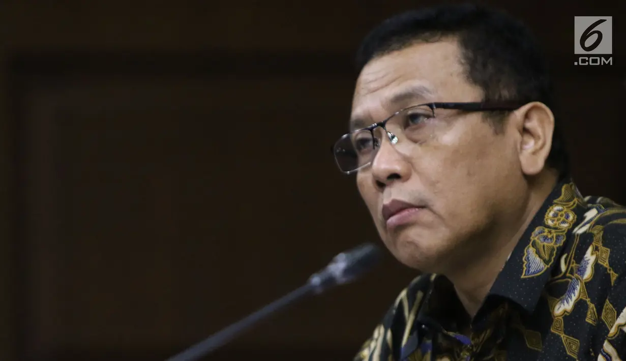 Terdakwa korupsi pengadaan dan pelaksanaan pembangunan kampus IPDN Sumbar di Kab Agam TA 2011, Dudy Jocom saat menjalani sidang lanjutan di Pengadilan Tipikor Jakarta, Rabu (5/9). Sidang mendengar keterangan saksi. (Liputan6.com/Helmi Fithriansyah)