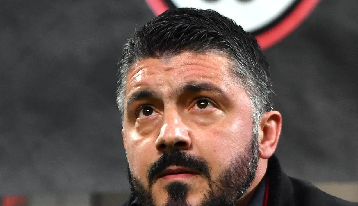 Ekspresi pelatih AC Milan, Gennaro Gattuso saat pertandingan antara AC Milan melawan Arsenal pada leg pertama 16 besar Liga Europa, di San Siro, Milan, Italia, Kamis (8/3). AC Milan takluk 0-2 dari Arsenal. (AP Photo/Luca Bruno)