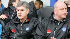 Portsmouth Manager Paul Hart (R) sits with his assistant Brian Kidd (L) prior the Premier League football match between Portsmouth FC and Manchester City FC at Fratton Park, on February 14, 2009. AFP PHOTO / Geoff Caddick.