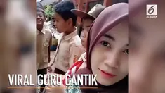 Seorang guru SD jadi perbincangan warganet setelah kecantikannya menghiasi dunia maya.