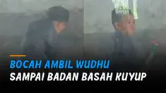 Bocah ini tunjukkan totalitas saat mengambil wudhu.