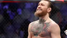 Conor McGregor tersenyum setelah mengalahkan Donald 'Cowboy' Cerrone pada pertarungan kelas welter UFC 246 di T-Mobile Arena, Las Vegas, Amerika Sertikat, Sabtu (18/1/2020). McGregor mengalahkan Cowboy pada detik ke-40. (AP photo/John Locher)