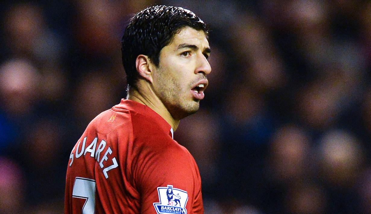 Luis Suarez menjadi penyerang mematikan di Liga Inggris bersama Liverpool sebelum hengkang ke Barcelona pada 2014. Ia tercatat telah mencetak 69 gol dan 39 assist dari 110 penampilannya. Namun, Suarez tak pernah merasakan gelar Liga Inggris. (AFP/Paul Ellis)