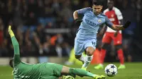 Sergio Aguero berperan penting dalam kemenangan Manchester City di leg pertama 16 besar Liga Champions. (PAUL ELLIS / AFP)