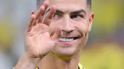 Hal tersebut terjadi setelah Ronaldo dkk ditahan imbang 1-1 oleh Al-Hilal melalui di menit injury time. (AFP/Fayez Nureldine)