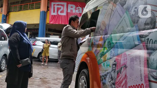 Warga Mulai Berburu Penukaran Uang Baru Lebaran
