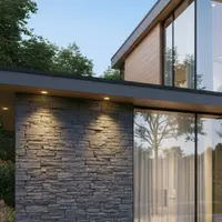 Gambar Rumah Minimalis Tampak Depan dengan Aksen Kaca Modern (Image by Gemini AI)