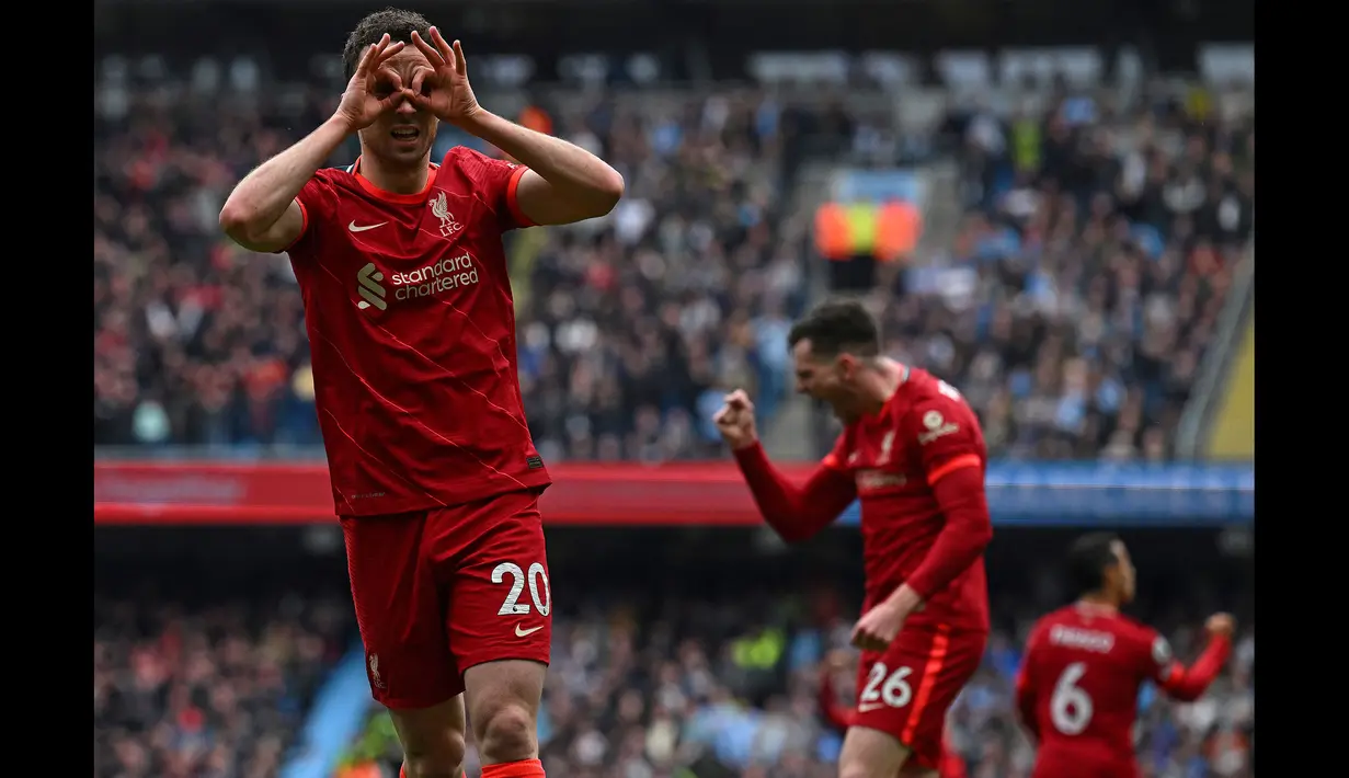 Striker Liverpool, Diogo Jota melakukan selebrasi setelah mencetak gol penyemimbang 1-1 saat pertandingan Liga Inggris antara Manchester City dan Liverpool di Etihad Stadium, 10 April 2022. (AFP/Paul Ellis)
