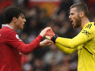 Terbuangnya David De Gea dari Manchester United pada bursa transfer pemain musim 2023/2024 memang telah melukai hati sang kiper yang telah 12 musim setia bersama Setan Merah. Namun sebagai kiper hebat, tentunya bukan perkara sulit untuk mendapatkan klub baru sebagai pelabuhan berikutnya. Tercatat ada 5 klub yang dikabarkan gencar untuk mendapatkan jasanya sebelum musim 2023/2024 bergulir. Berikut kelima klub tersebut. (AFP/Oli Scarff)