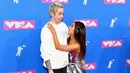 Ditanya mengenai ciuman pertama, Ariana Grande pun mengatakan hal menggemaskan mengenai momen itu. (Nicholas Hunt  GETTY IMAGES NORTH AMERICA  AFP)