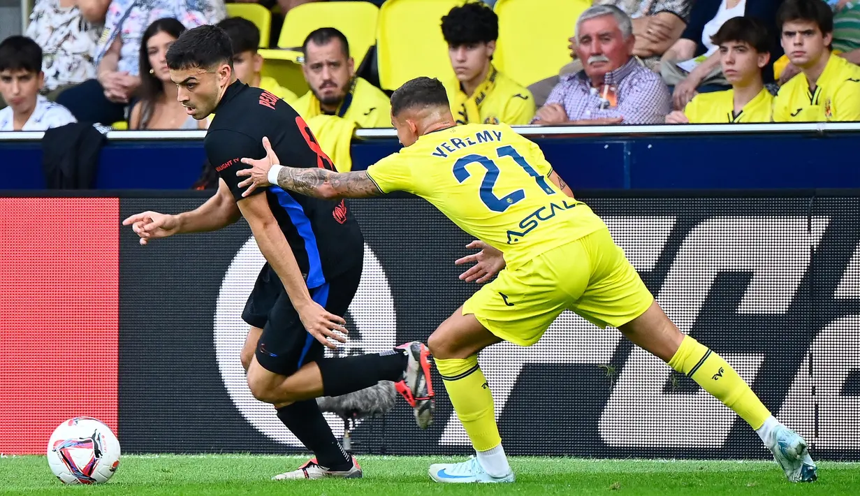 Tuan rumah Villarreal terus berupaya memperkecil ketertinggalan dari Barcelona. (JOSE JORDAN/AFP)