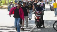 Puluhan Anak muda di Banyuwangi bermian Skateboard untuk peringati Skatebprding Dunia (Hermawan Arifianto/Liputan6.com)