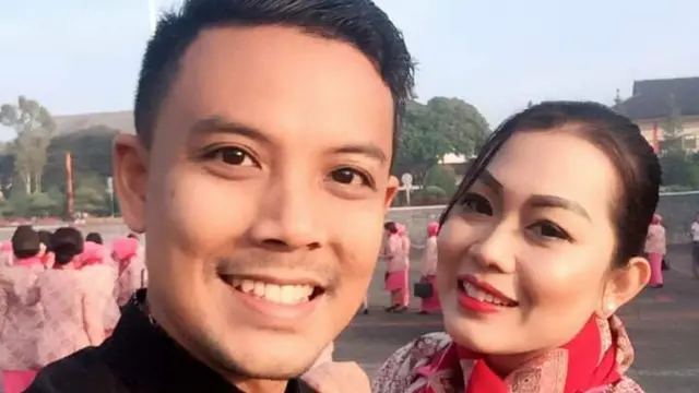 Kapolres Baubau AKBP Erwin Pratomo bersama istri Tari Erwin Pratomo.(Liputan6.com/Dok Tari Erwin Pratomo)