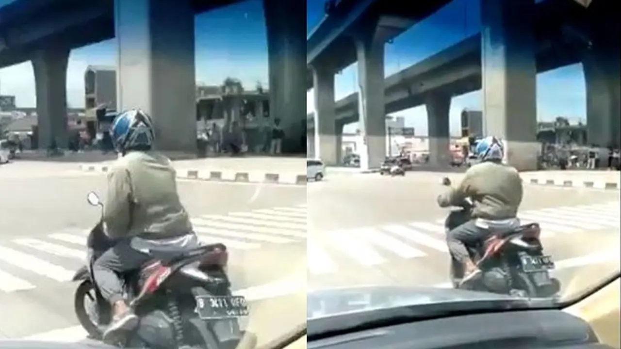 Aksi Kocak Pengendara Motor Ini Tunjukkan Skill di Perempatan Jalan Raya