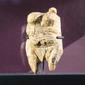 Venus von Hohle Fels, patung gading yang berumur antara 40.000 dan 35.000 SM dipajang selama pameran di Museum Martin-Gropius-Bau di Berlin, Jerman (20/9). Pameran arkeologi ini berlangsung 21 September 2018 hingga 6 Januari 2019. (AP Photo/Frank Jordans)