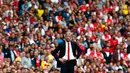 Pelatih Arsenal, Arsene Wenger, memperhatikan tim asuhannya berlaga kontra Manchester City dalam laga lanjutan Liga Primer Inggris di Stadion Emirates, London, (13/9/2014). (REUTERS/Eddie Keogh)